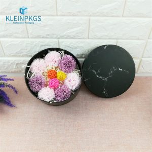 round crafted paper box with wooden cover