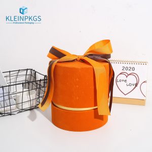small cylinder box with ribbon